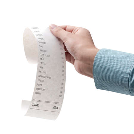 Woman checking a grocery receipt Isolated on white background