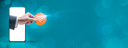 Businessman hand coming out of a smartphone screen and holding a Wi-Fi icon, connectivity concept