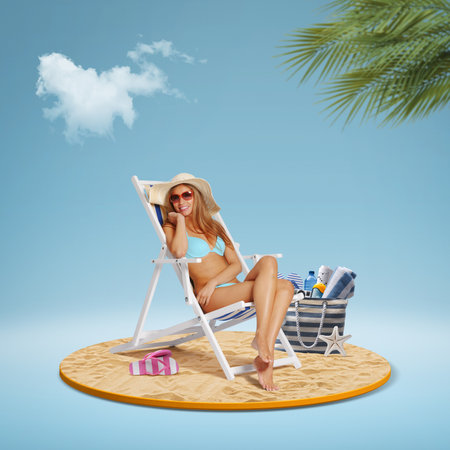 Happy smiling tourist relaxing on a deckchair and sunbathing on the tropical beachの写真素材