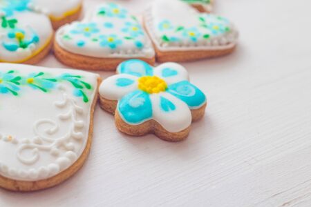 Homemade cookies made in the form of heart with multi-colored glaze.の写真素材