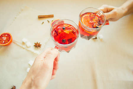 A loving couple drinks fruit tea. View from above.の写真素材