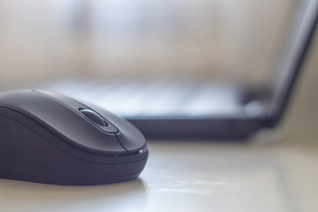 Black computer mouse close-up.の写真素材