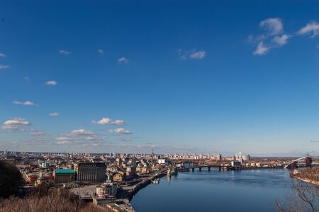 View of the metropolis from a height. City of Kiev, Ukraine. The Dnieper River flowing through the center of Kiev.の写真素材