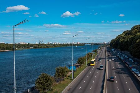 KIEV, UKRAINE - August 2019. The road along the Dnieper River. Embankment in the city center.のeditorial素材