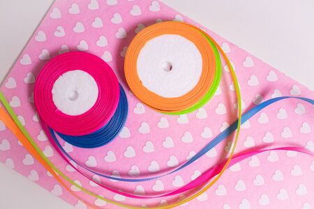 Needlework. Multicolored ribbons for handmade products. Passion for the soul. Bright ribbons for sewingの写真素材