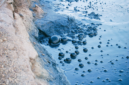 Gray holes bubbled in Namafjall Hverir geothermal areaの写真素材
