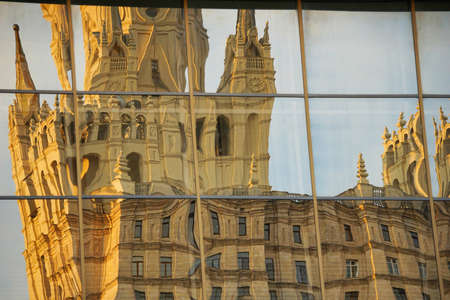 A large historic building is reflected and distorted in mirrorsの写真素材