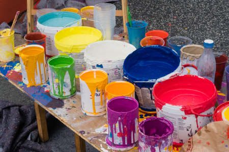 multi color cans open on a tableの写真素材