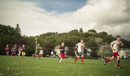 kids playing footballのeditorial素材