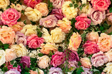 floral wedding party decor. Wall with curly Flowers. Wall with beautiful flowers. Summer flowers on...