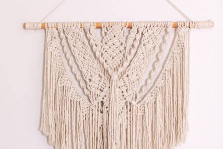 Wall panel in style of Boho made of cotton threads using the macrame technique for home decor and...