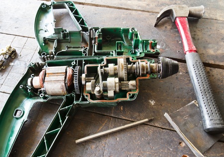 The electric drill repair  by woodworkerの写真素材