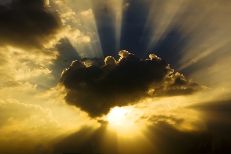 Image of sun shine through rain cloudの写真素材