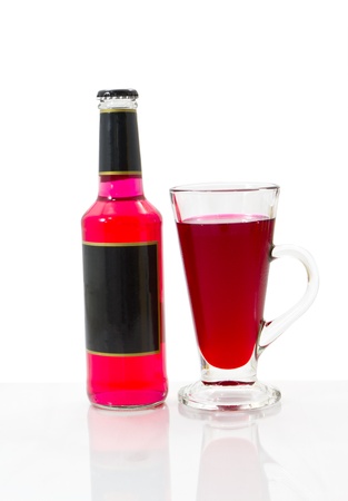 Red wine bottles and wine glass isolated on white.の写真素材