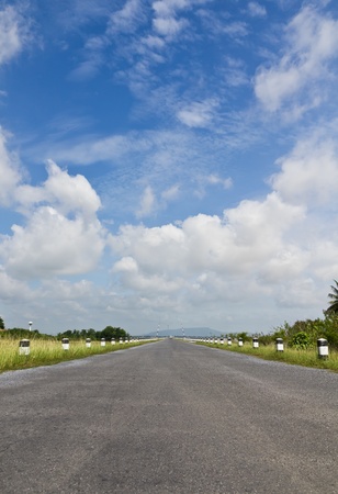 Road asphalt to mountain islandの写真素材