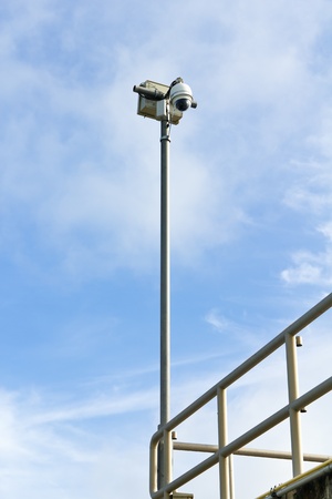 Dome CCTV camera against the blue skyの写真素材