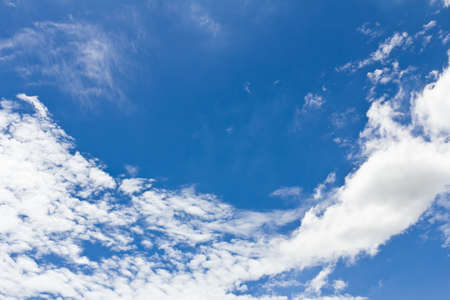 Beautiful blue sky and white clouds with shaped curveの写真素材