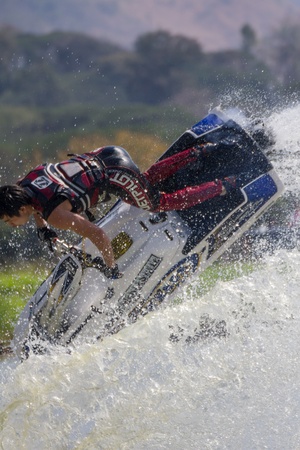 SARABURI THAILAND-JANUARY 20: Sonswut Rappasubpisan in action during show Freestyle the Jet ski  stunt action  on Jan 20, 2013 in SARABURI,Thailand.のeditorial素材