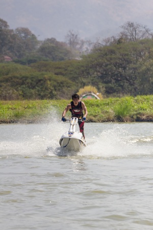 SARABURI THAILAND-JANUARY 20: Sonswut Rappasubpisan in action during show Freestyle the Jet ski  stunt action  on Jan 20, 2013 in SARABURI,Thailand.のeditorial素材