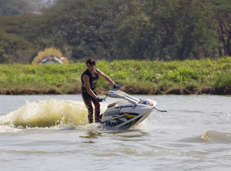 SARABURI THAILAND-JANUARY 20: Sonswut Rappasubpisan in action during show Freestyle the Jet ski  stunt action  on Jan 20, 2013 in SARABURI,Thailand.のeditorial素材