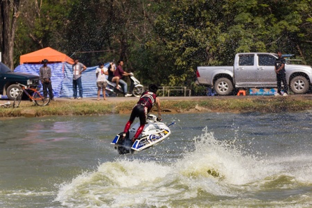 SARABURI THAILAND-JANUARY 20: Sonswut Rappasubpisan in action during show Freestyle the Jet ski  stunt action  on Jan 20, 2013 in SARABURI,Thailand.のeditorial素材