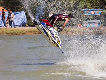 SARABURI THAILAND-JANUARY 20: Sonswut Rappasubpisan in action during show Freestyle the Jet ski  stunt action  on Jan 20, 2013 in SARABURI,Thailand.のeditorial素材