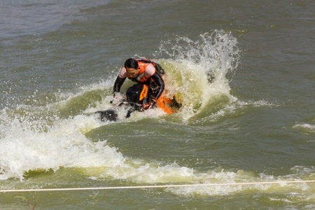 SARABURI THAILAND-JANUARY 20: Boonlue Korbangyang in action during show Freestyle the Jet ski  stunt action  on Jan 20, 2013 in SARABURI,Thailand.のeditorial素材