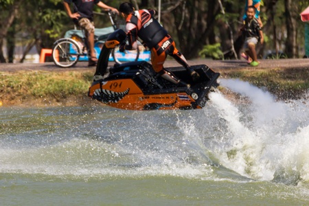 SARABURI THAILAND-JANUARY 20: Boonlue Korbangyang in action during show Freestyle the Jet ski  stunt action  on Jan 20, 2013 in SARABURI,Thailand.のeditorial素材