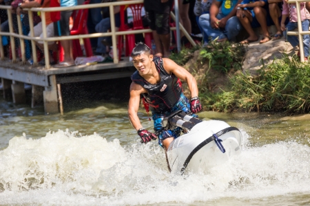 SARABURI THAILAND-JANUARY 20: Veerapong Maneechom in action during show Freestyle the Jet ski  stunt action  on Jan 20, 2013 in SARABURI,Thailand.のeditorial素材