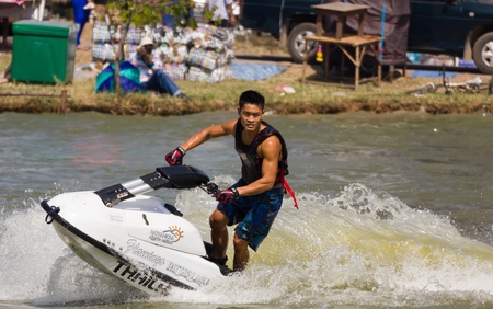 SARABURI THAILAND-JANUARY 20: Veerapong Maneechom in action during show Freestyle the Jet ski  stunt action  on Jan 20, 2013 in SARABURI,Thailand.のeditorial素材