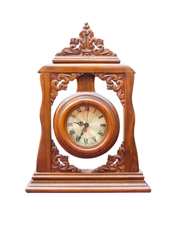 Vintage clock made of wood isolated on whiteの写真素材