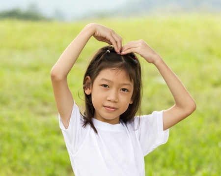 Outdoors portrait of beautiful Asian young girlの写真素材