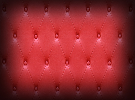 Luxurious red leather seat upholstery use for backgroundの写真素材