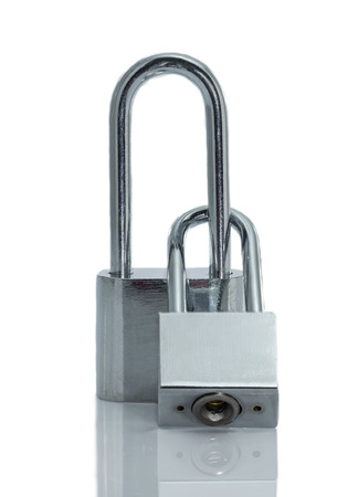 Metallic padlock isolated on white backgroundの写真素材