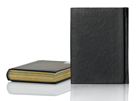Black blank book,Closed black book with shadow on white backgroundの写真素材
