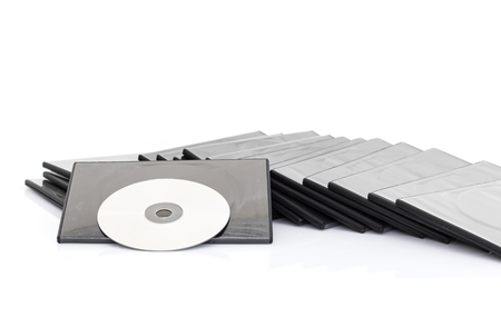 DVD boxes with disc on white backgroundの写真素材