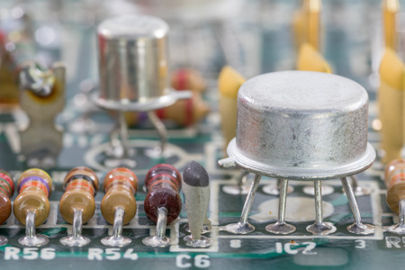 Closeup electronic hardware . Resistor and condensers assembly on the circuit board