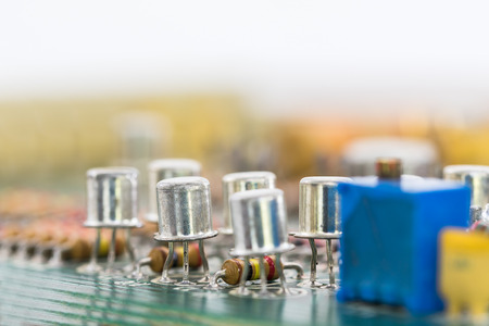 Closeup electronic hardware . Resistor and condensers assembly on the circuit board