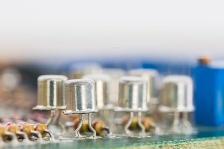 Closeup electronic hardware . Resistor and condensers assembly on the circuit boardの写真素材
