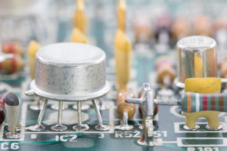 Closeup electronic hardware . Resistor and condensers assembly on the circuit boardの写真素材