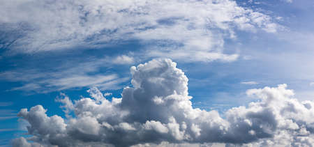 Panoramic fluffy clouds in the blue sky, Soft white clouds against blue skyの写真素材