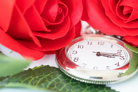 Close up pocket watch and red roses flower with copy space, Valentine'sDay conceptの写真素材
