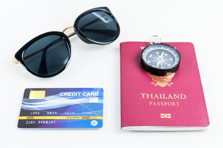 Passports and credit cards,sunglases on white background, Business travel and tourism conceptの写真素材