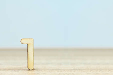 Close up wooden numeric on table with copy space,number sevenの写真素材