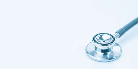Medical stethoscope on blank notepad as medical conceptの写真素材