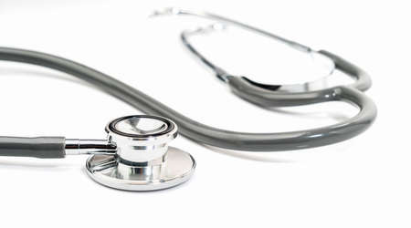 Medical stethoscope on blank notepad as medical conceptの写真素材