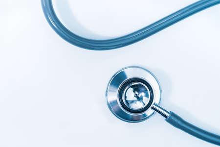 Medical stethoscope on blank notepad as medical conceptの写真素材