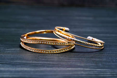 Closeup Gold ring diamond gem. Gold wedding rings with diamond