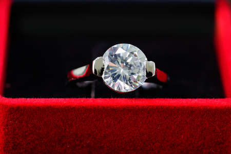 Close up diamond ring in red jewel boxの写真素材
