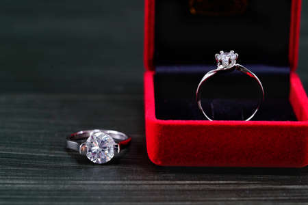 Close up diamond ring in red jewel boxの写真素材